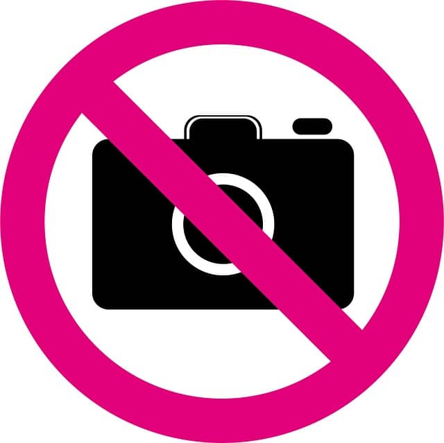 a no cameras allowed sign