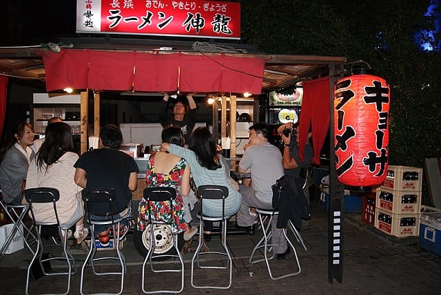 a Japanese food stall at night