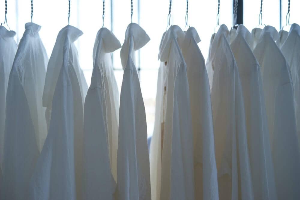 a rail of white shirts