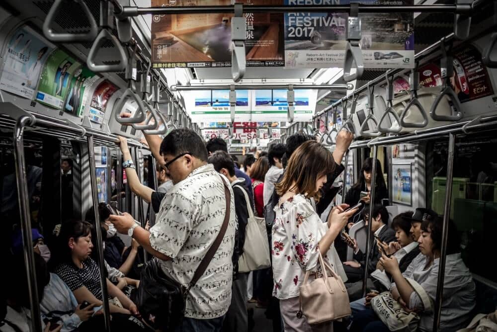 people taking the subway in Japan