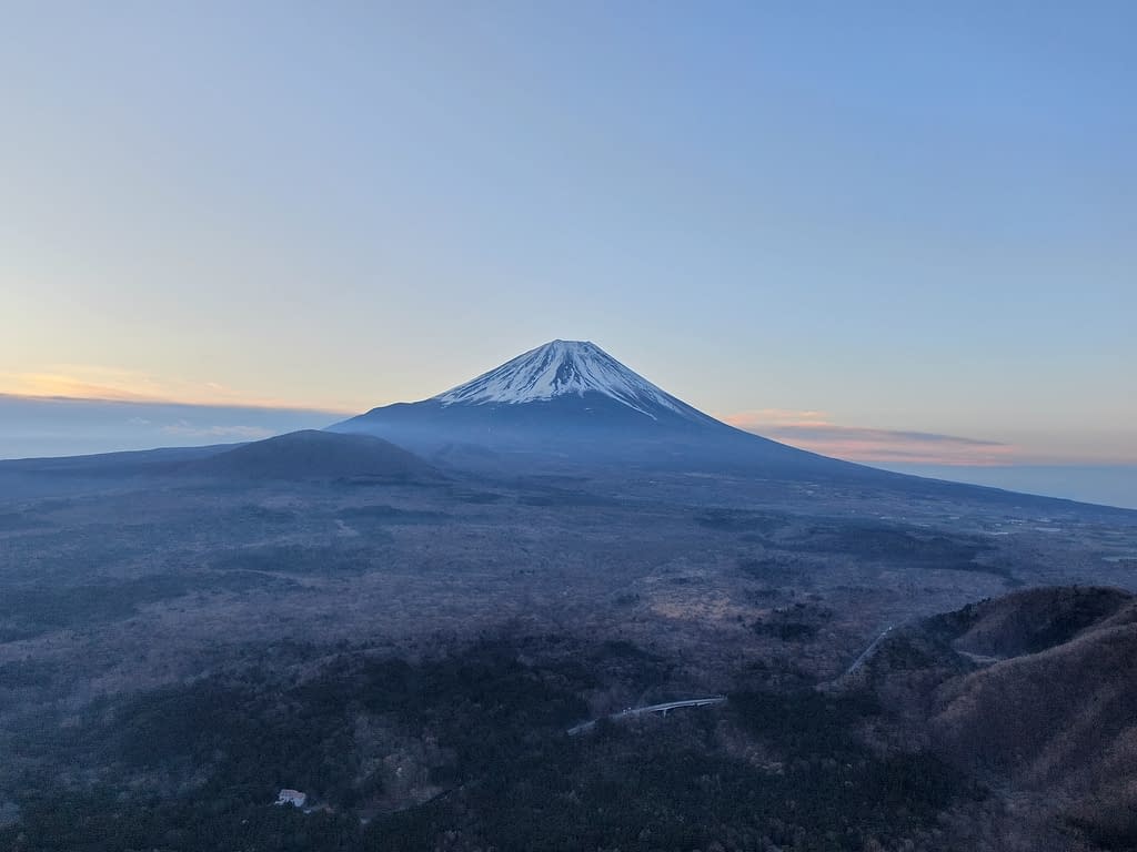 Mount Fuji's magnificence illuminated in the soft light of dawn