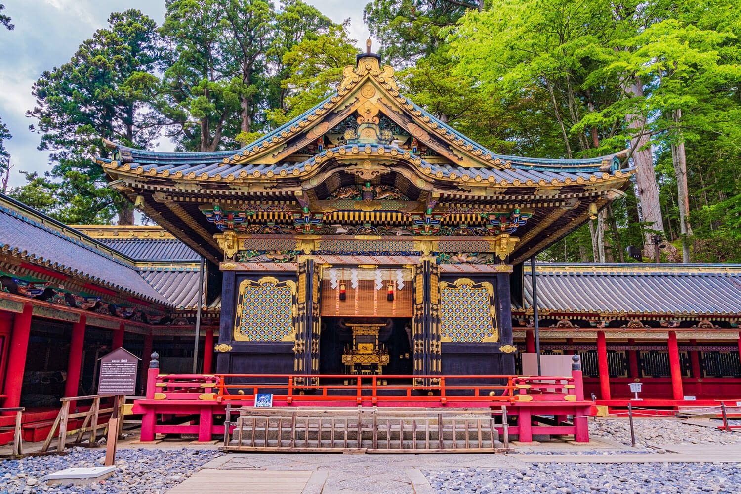 Japanese style temple with the forest in the background