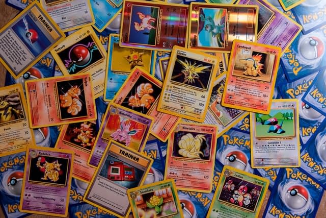 A stack of pokemon trading cards.