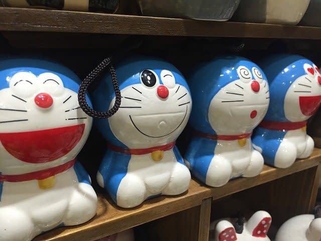 Doraemon toys on a shelf.
