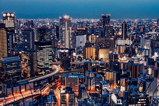 A busy city in Japan at night time.