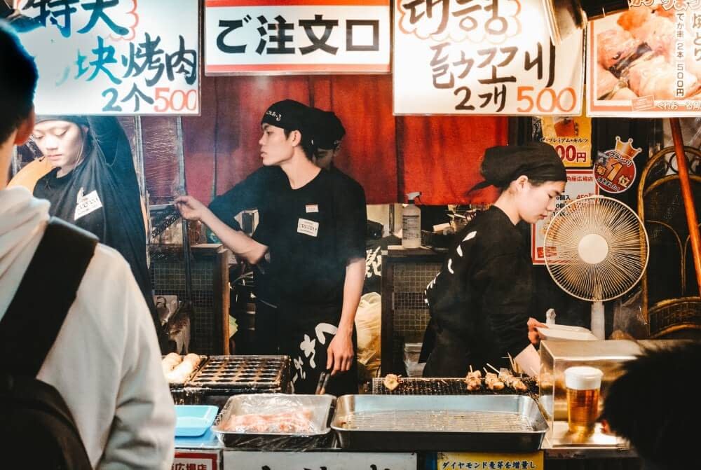 Chefs preparing food in Osaka
