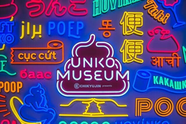 A neon sign in the Unko Museum.