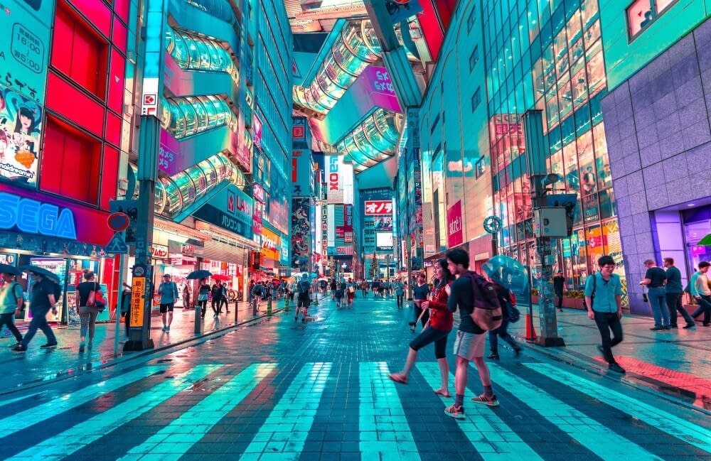 a street scene of Tokyo with neon lights