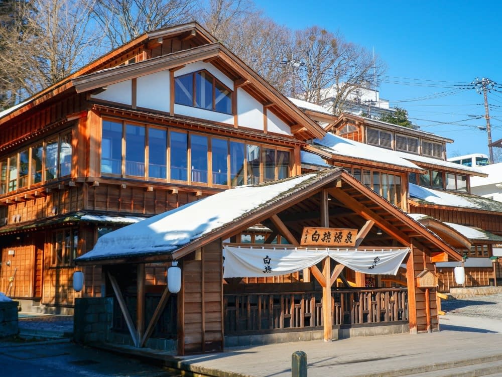 A picturesque wooden building in Kusatsu, Japan.