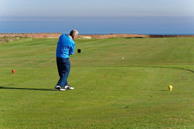 A man taking a shot from an OB Tee